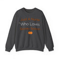 Just A Nurse Who Loves Spooky Season Sweatshirt | Nurse Halloween Sweatshirt | Spooky Nurse Sweatshirt | Healthcare Worker Gift | Halloween 2026