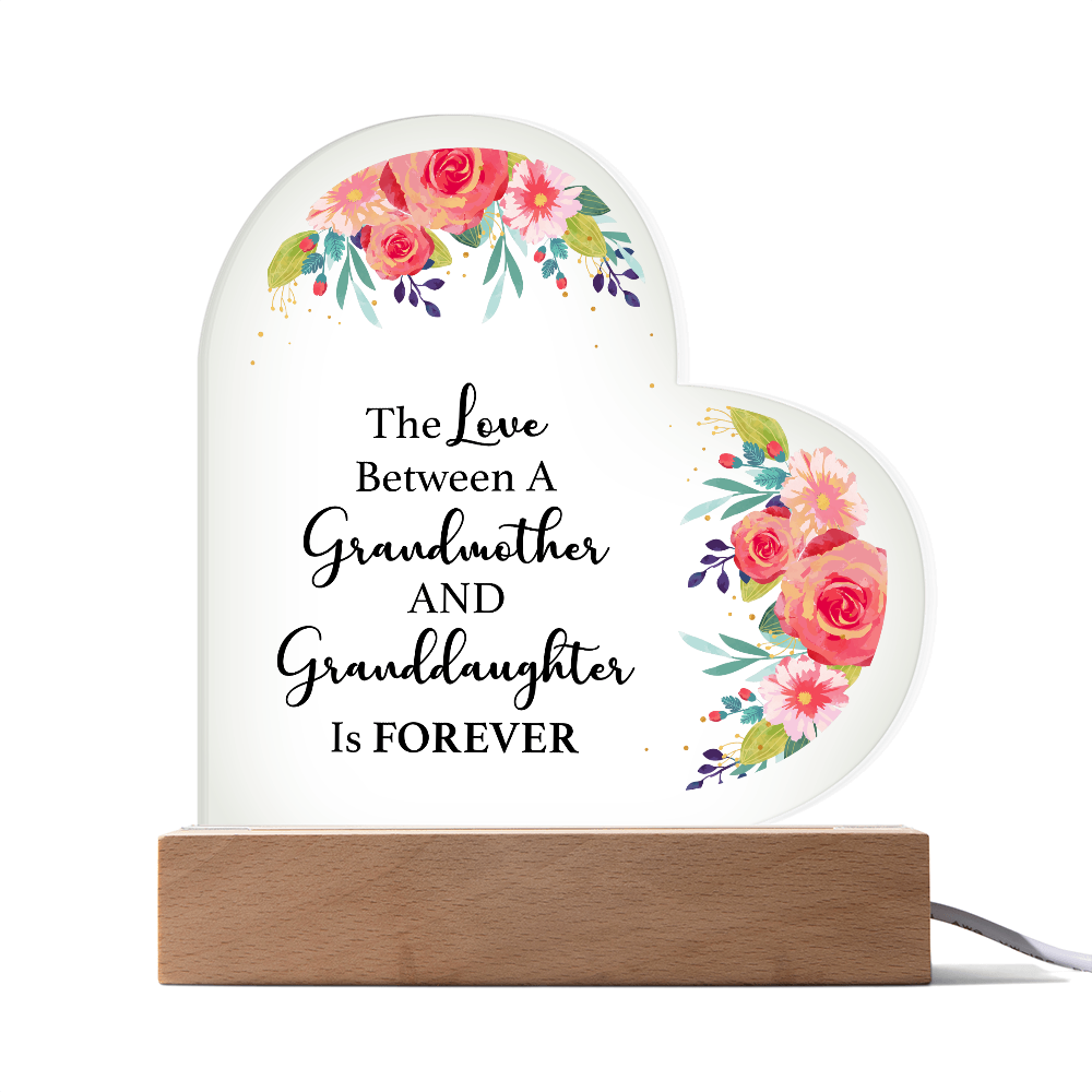 The Love Between A Grandmother And Granddaughter Acrylic Heart Plaque - Gift for Grandma