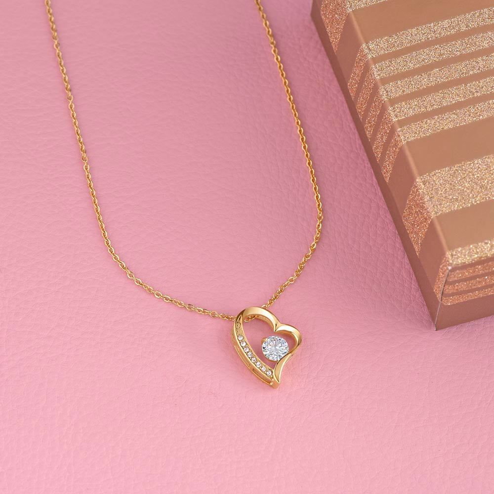 Forever Love necklace flat lay with gift box